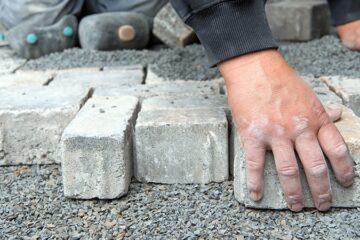 Hardscape paver walkway being installed