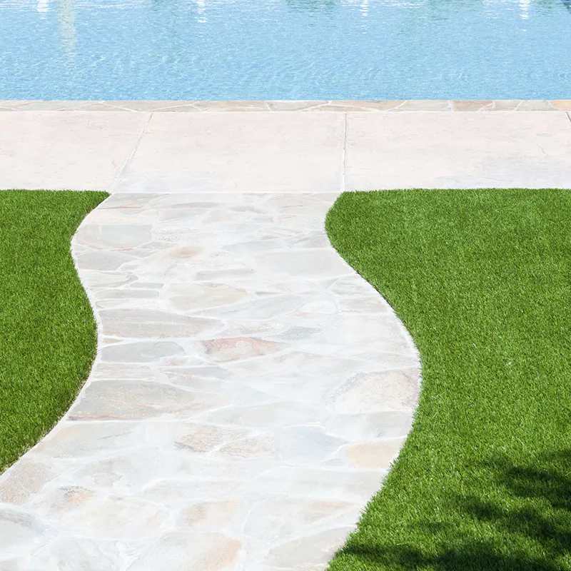 Artificial turf install by Lawn Panther around pool in NC